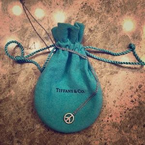 Tiffany & Co sterling silver peace pendant w chain